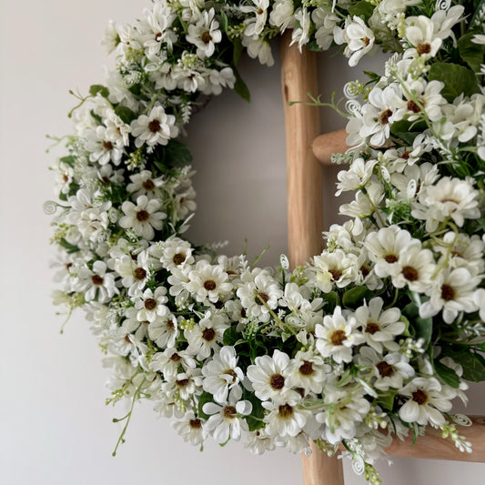 Wild Daisy Wreath featuring faux wildflowers and greenery, UV-protected to maintain colour and beauty outdoors.