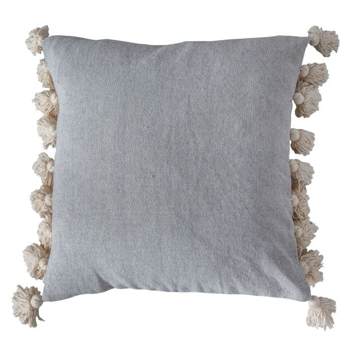 Grey textured cotton cushion with cream tassels on each edge.
