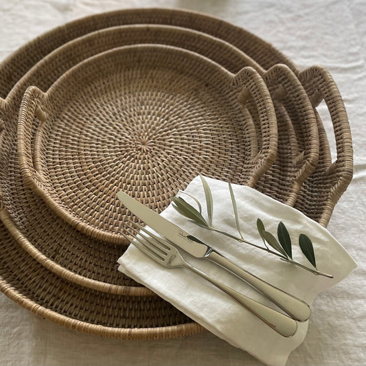 Ethically sourced whitewashed rattan tray adding rustic texture and effortless charm to a neutral interior.