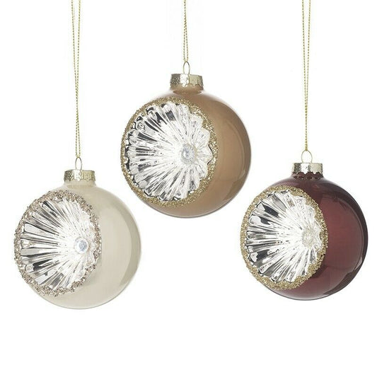Set of three pearlescent Christmas baubles with delicate cut out detailing. Displayed on a white background.