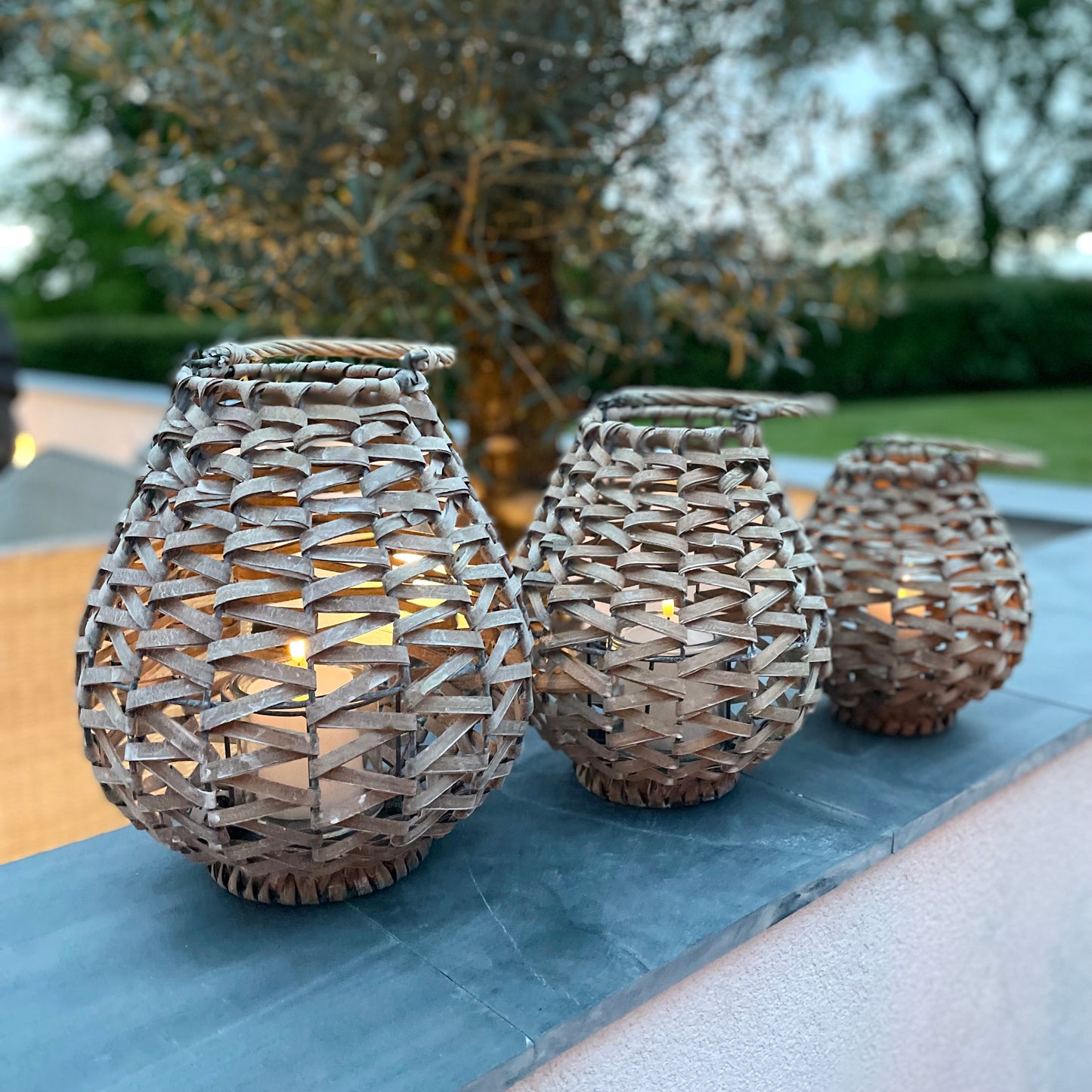 Natural rattan lantern for home or garden, perfect alone or in a set of three with candles or fairy lights.