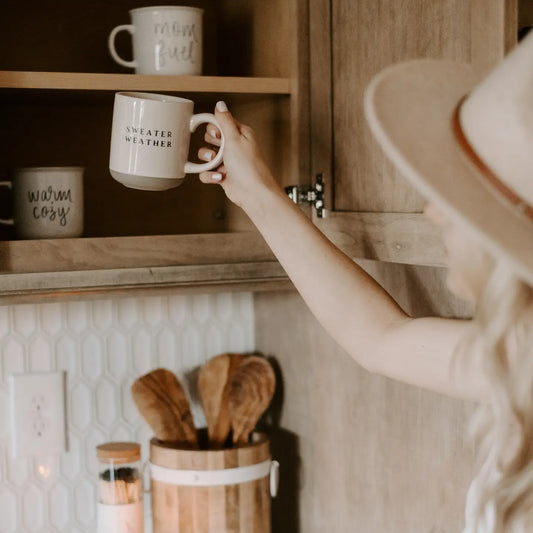 Stoneware mug for tea or coffee in kitchen setting.
