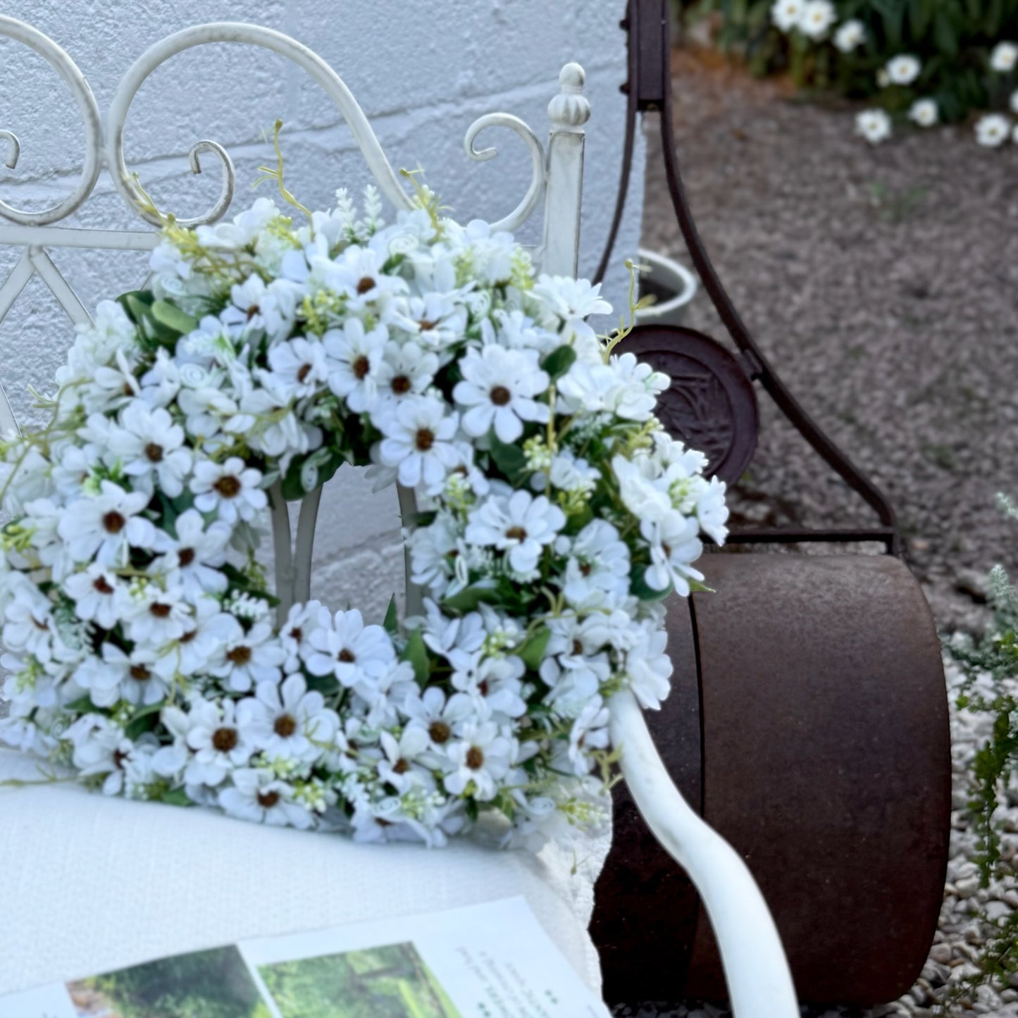 Handcrafted faux Wild Daisy Wreath with soft greenery and delicate daisies, perfect for front doors or indoor decoration.