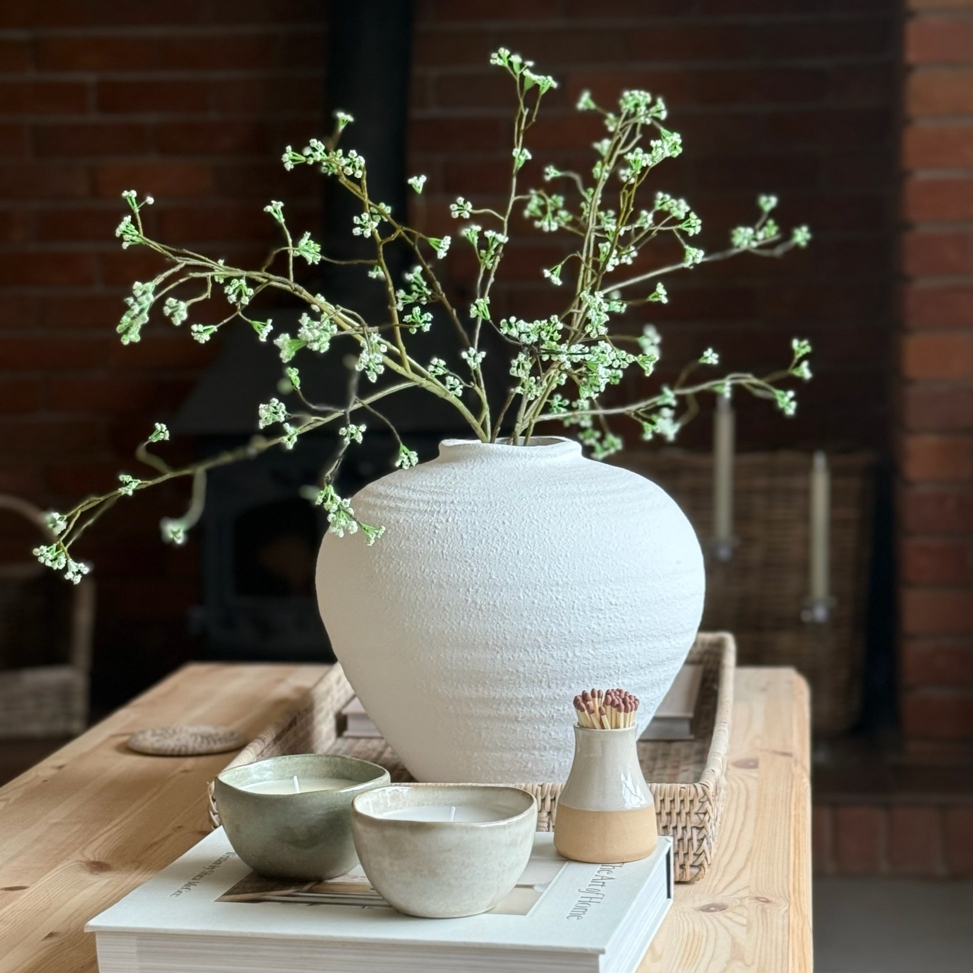 Lifelike faux Woodland Bloom Branch – add rustic charm and soft countryside texture to your home decor. Perfect styled alone or grouped in a vase.