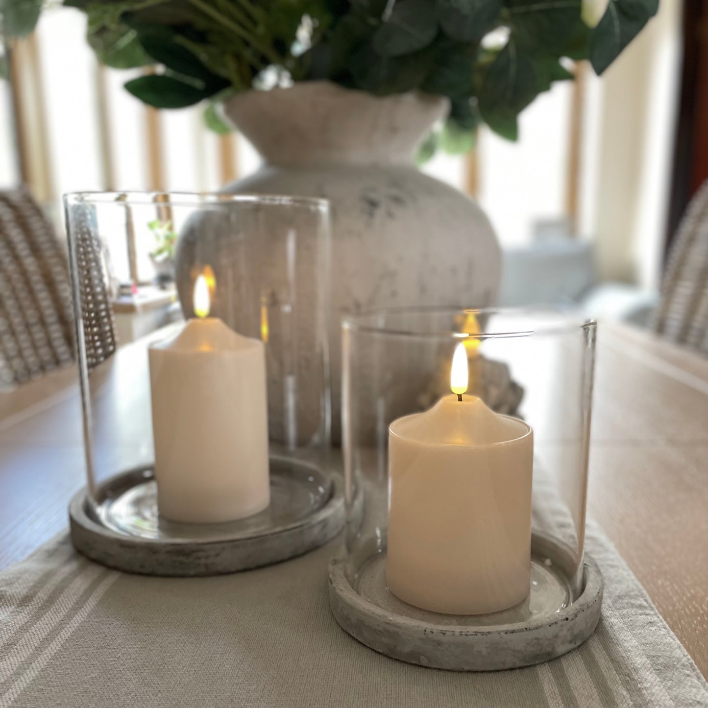 Modern earthy toned hurricane candle holder adding warmth and elegance to a living space.