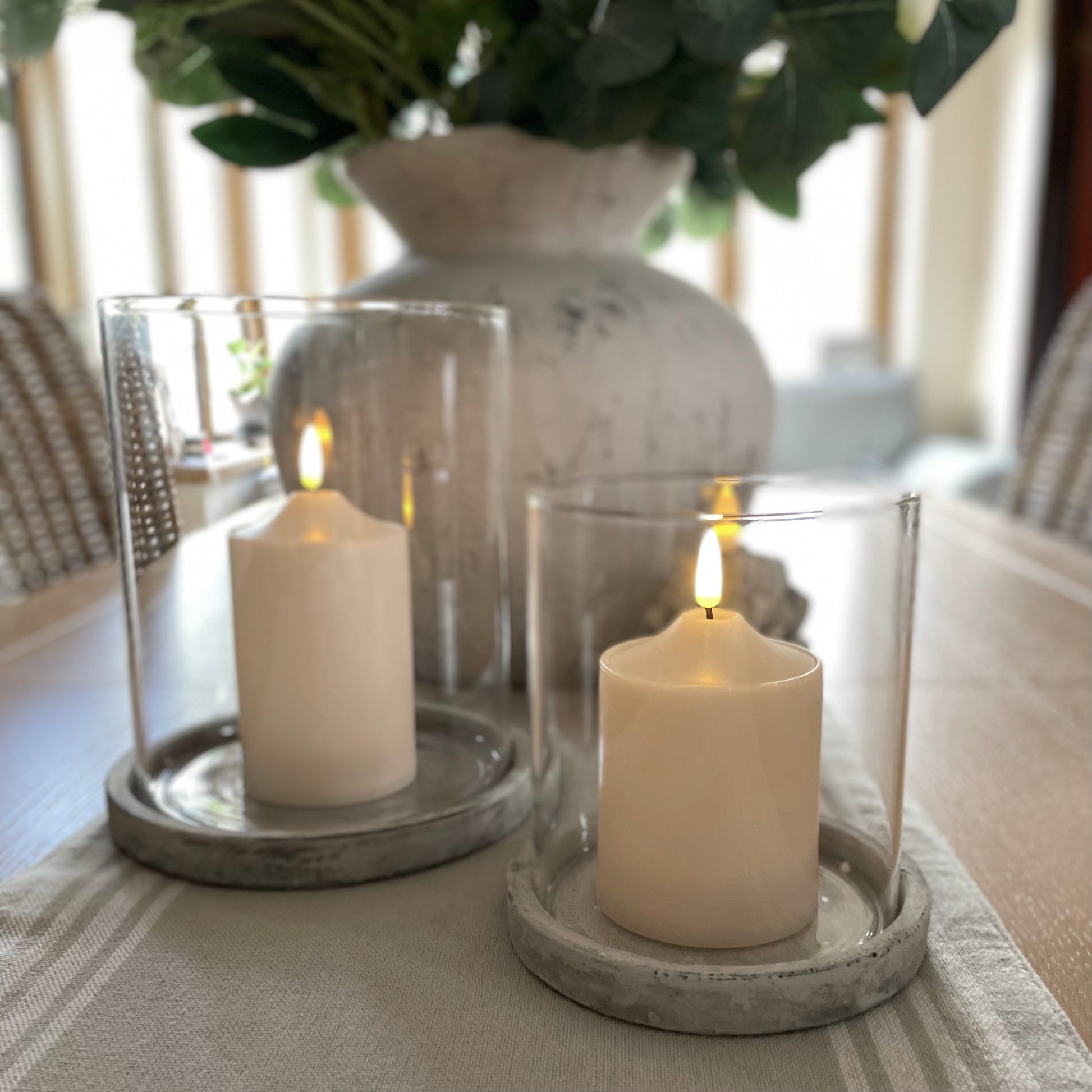 Modern earthy toned hurricane candle holder adding warmth and elegance to a living space.