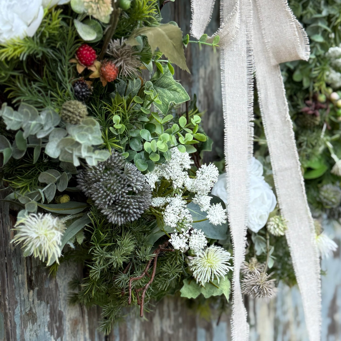 Handcrafted floral wreath with blackberries, cow parsley, and natural foliage, UV protected and perfect for styling on doors or indoors with a gentle, nostalgic feel.