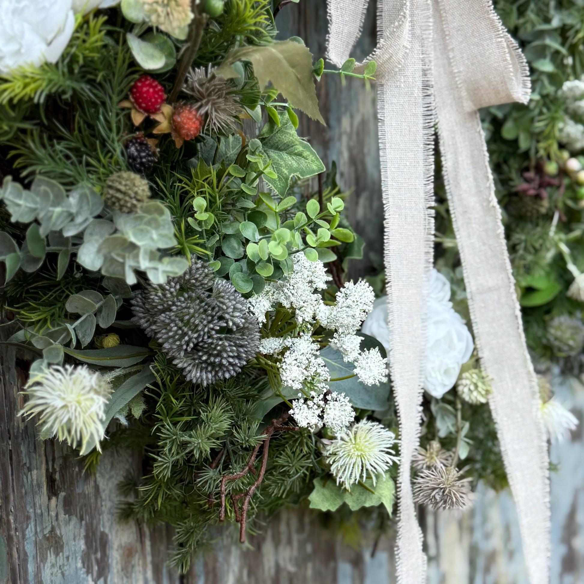 Handcrafted floral wreath with blackberries, cow parsley, and natural foliage, UV protected and perfect for styling on doors or indoors with a gentle, nostalgic feel.