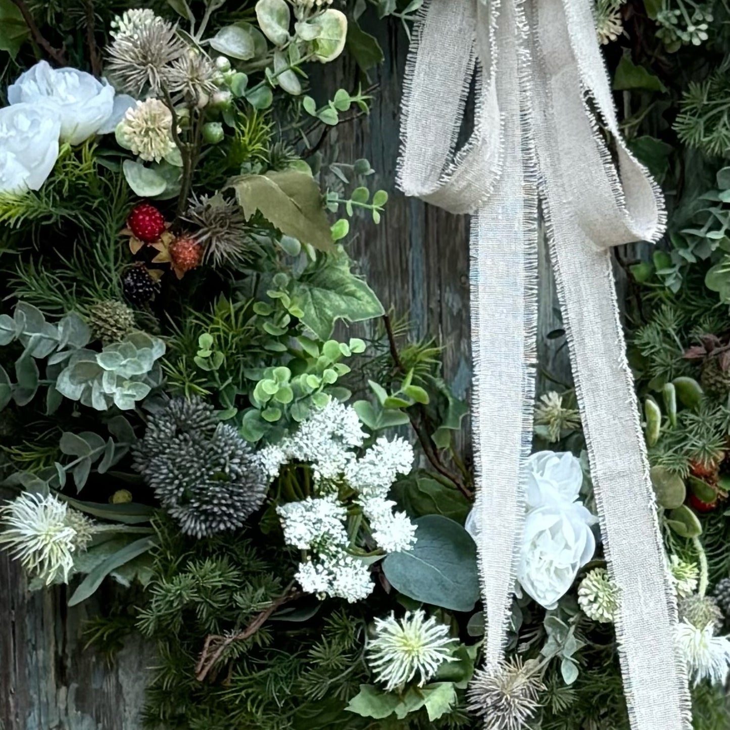 Exclusive Belle & Bramble Interiors wreath with delicate blackberries, thistles, and soft seasonal blooms, capturing rustic countryside charm and timeless elegance.