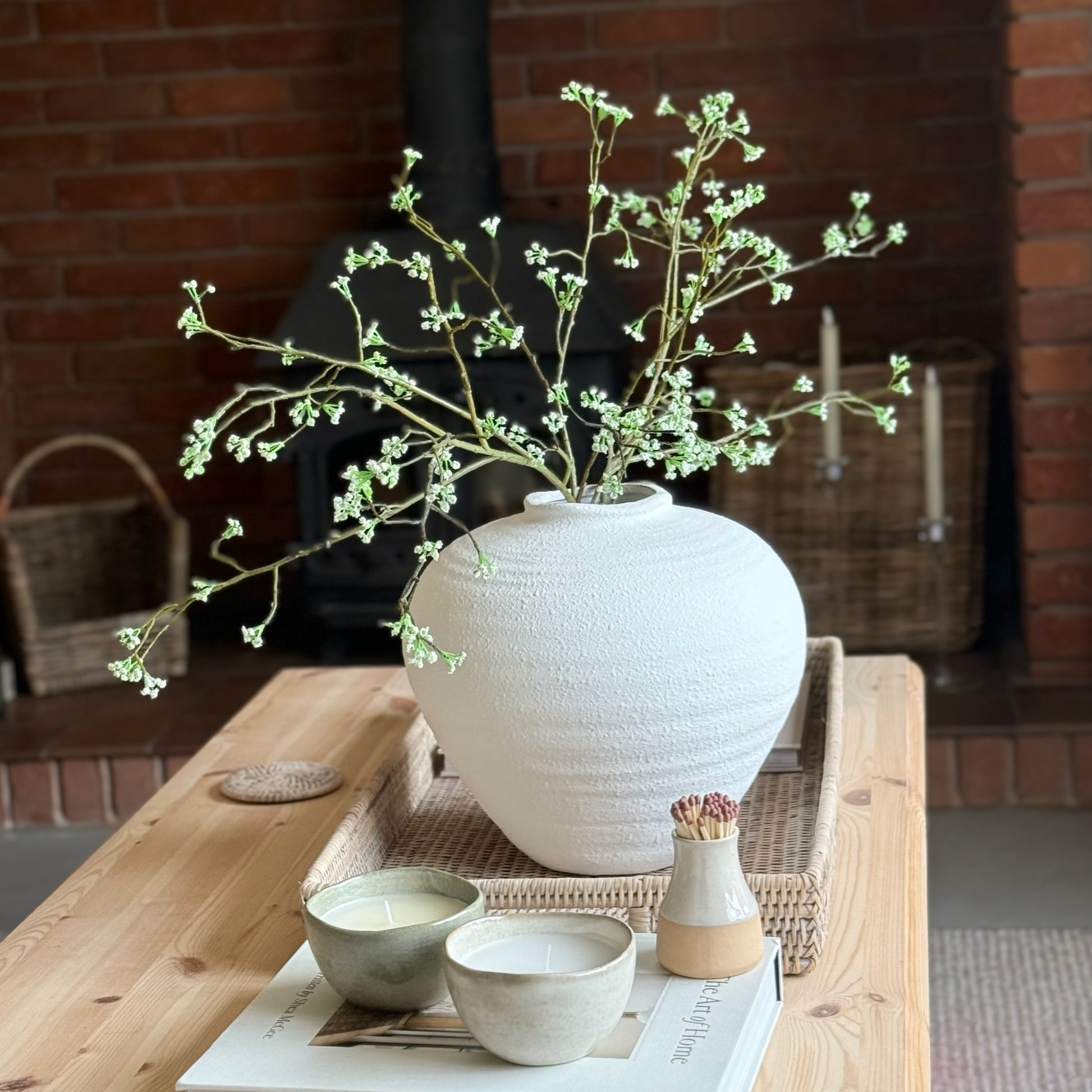 Lifelike faux Woodland Bloom Branch – add rustic charm and soft countryside texture to your home decor. Perfect styled alone or grouped in a vase.