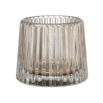 Elegant glass candle holder on a white background.