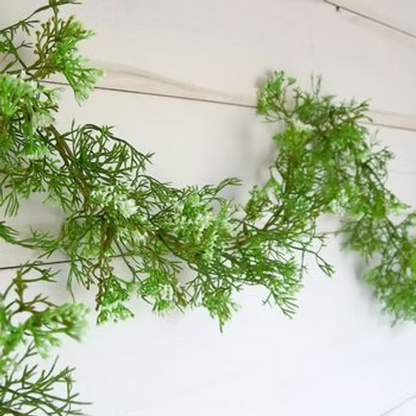 Artificial elderflower garland featuring realistic white flowers and eye loops for easy hanging around the home or garden.