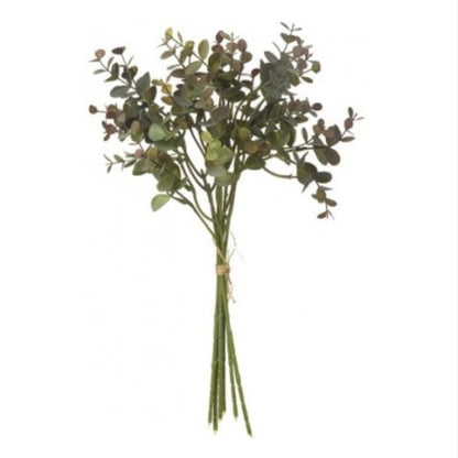 Close up of artificial eucalyptus spray with soft green and burgundy tinted leaves. 