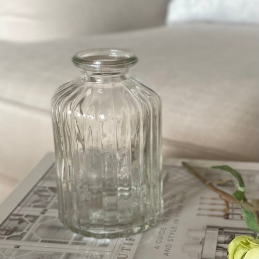 Versatile decorative bud vase for flowers or candles in home setting