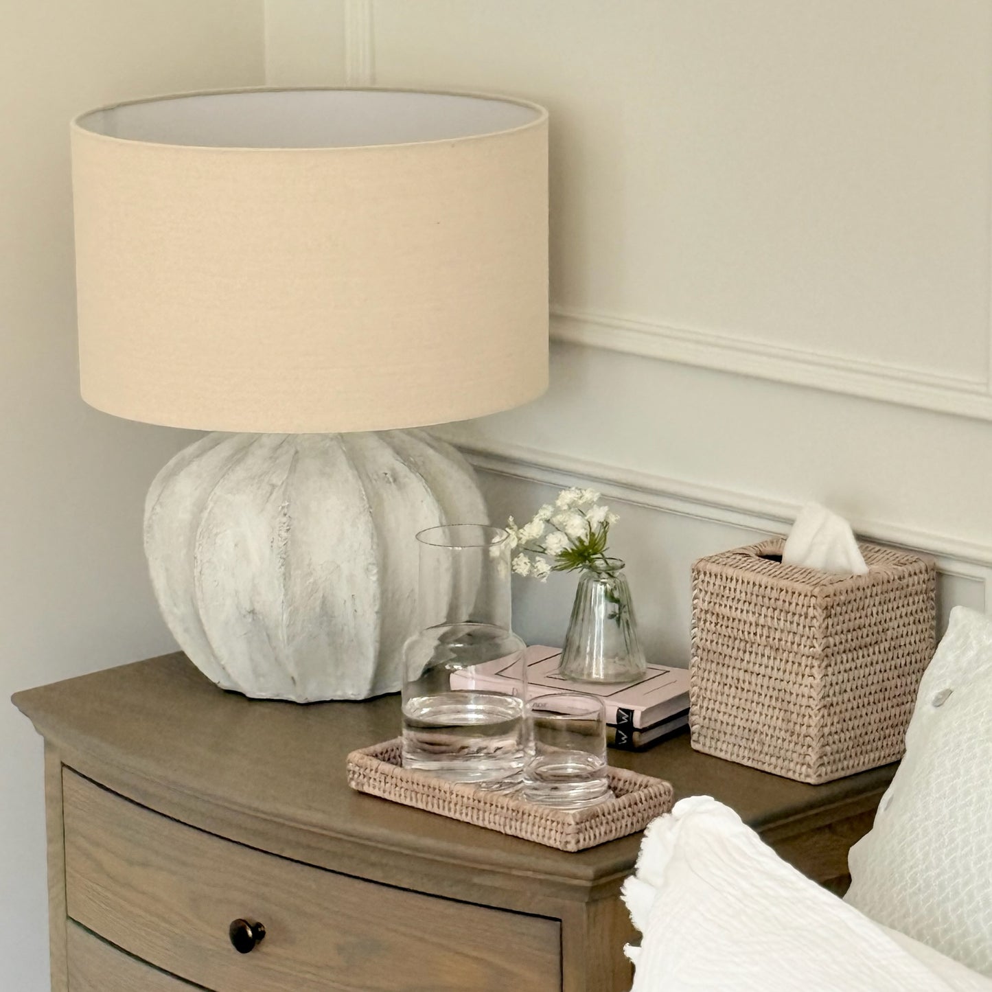 Handcrafted Darcy fluted lamp with rustic finish, adding warm light and texture to a bedside table or cosy corner.