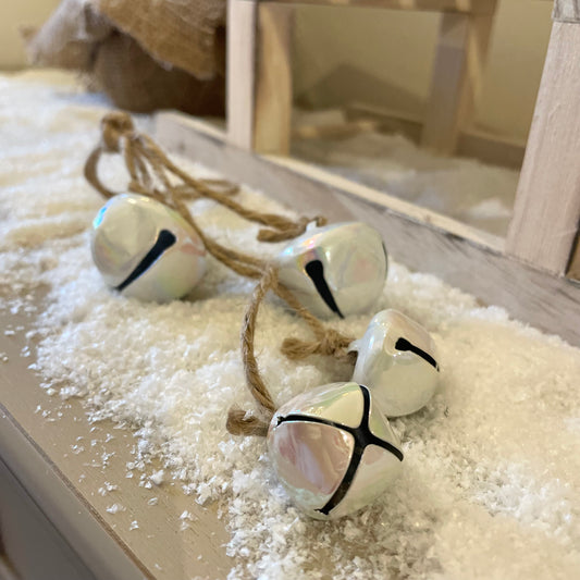 Close up of shimmering Christmas bells ready for hanging.