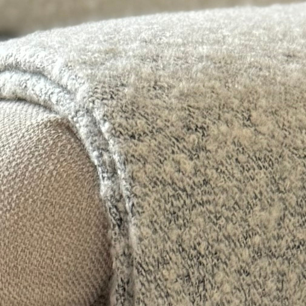 Close-up of textured fabric with a neutral color palette