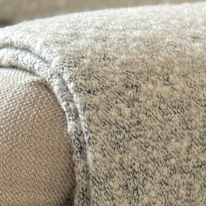 Close-up of textured fabric with a neutral color palette