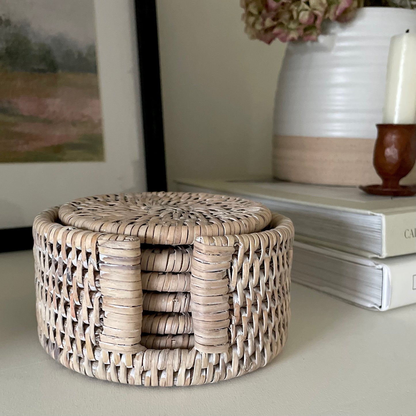 Set of 6 handcrafted whitewashed rattan coasters with holder.