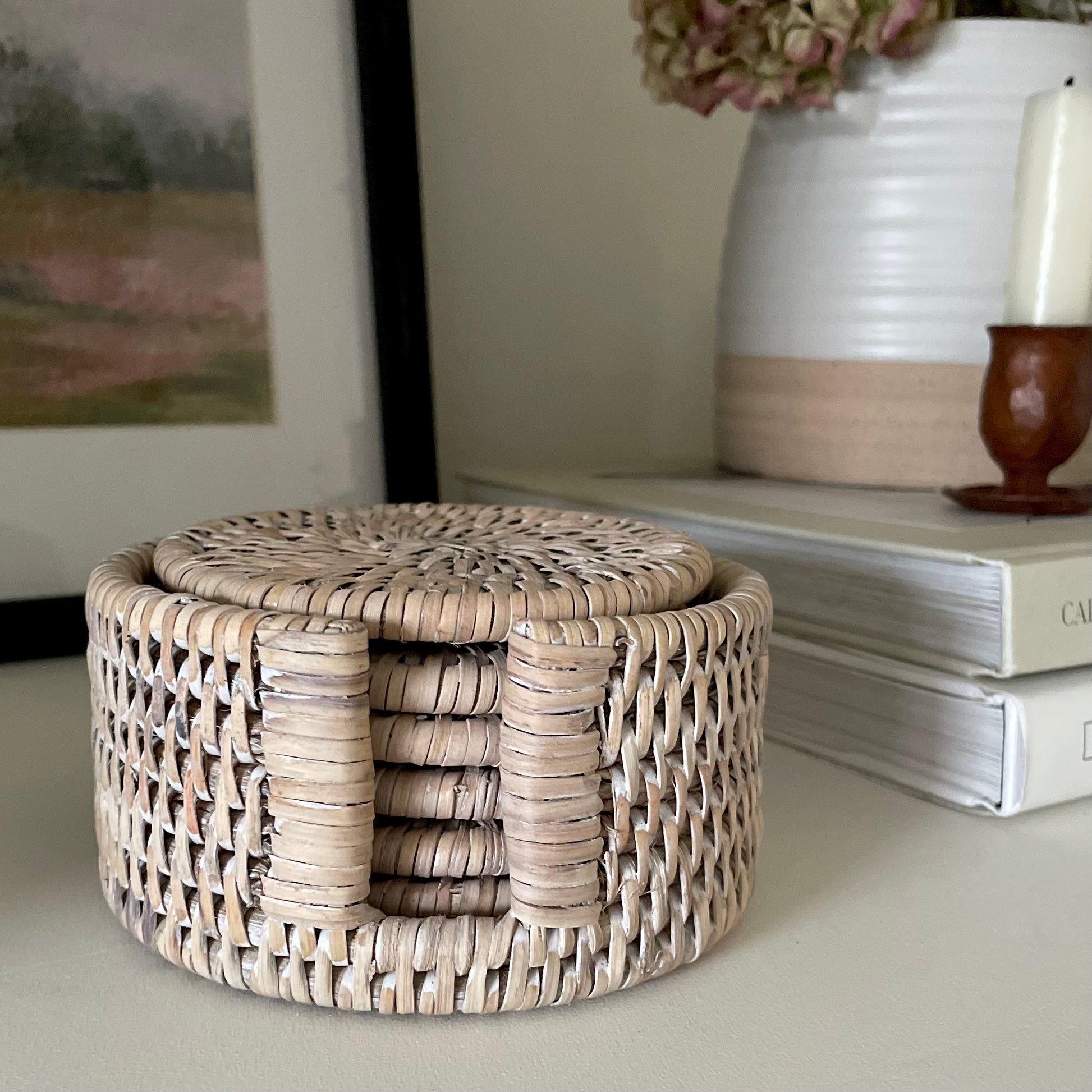 Set of 6 handcrafted whitewashed rattan coasters with holder.