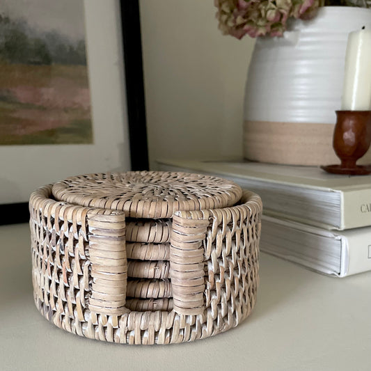 Set of 6 handcrafted whitewashed rattan coasters with holder.
