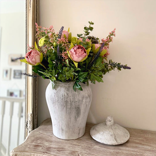 Neutral stone effect Serena Ginger Jar styled on a wooden console table with soft natural light and faux flowers.