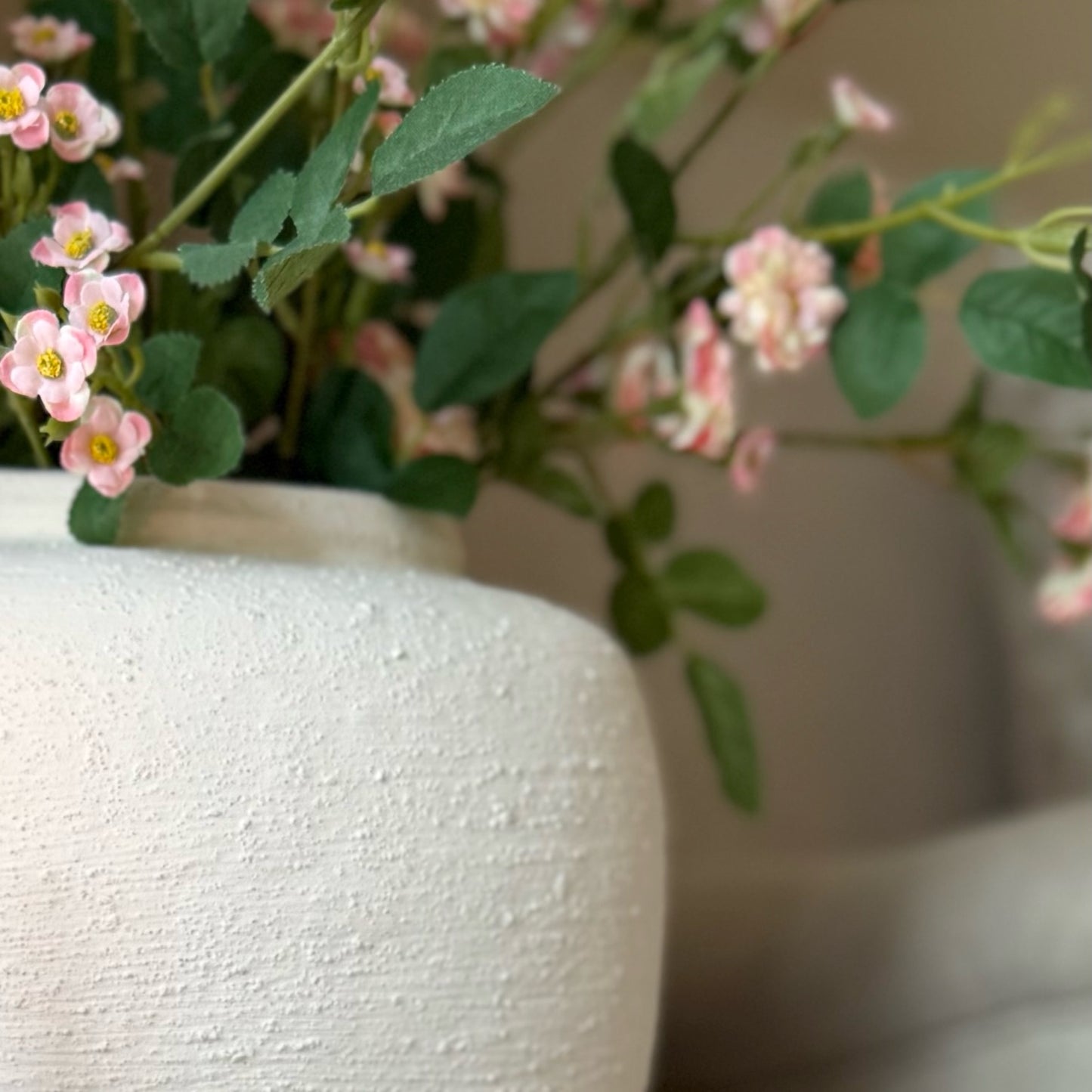 Textured Hanley Vase with natural finish, styled on a console table with soft neutral decor for a calm, timeless look.