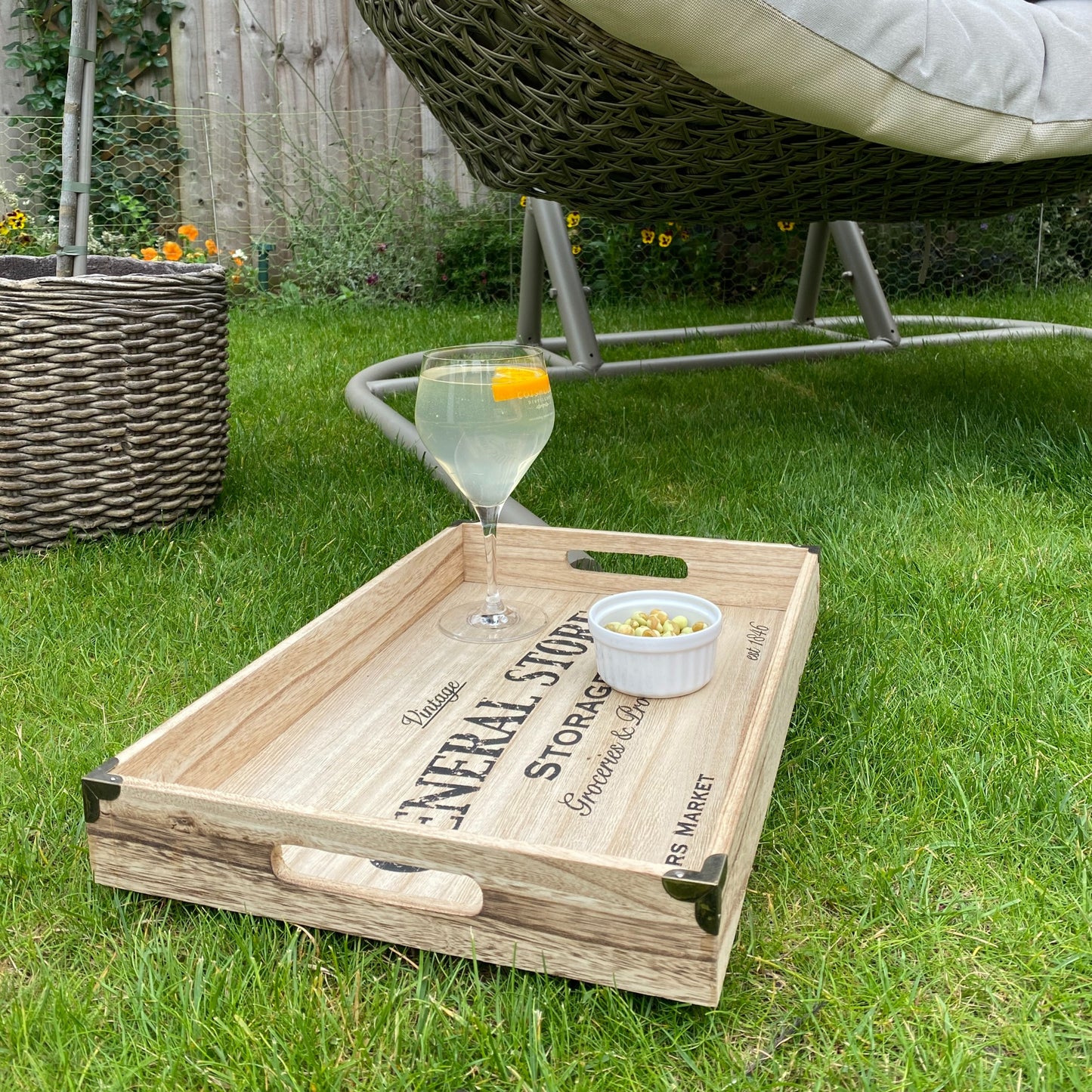 Set of 2 industrial wooden trays with metal corners and “General Store” print styled on a table.